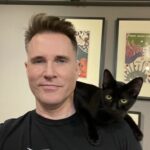2023 Greg with shoulder cat Nyx